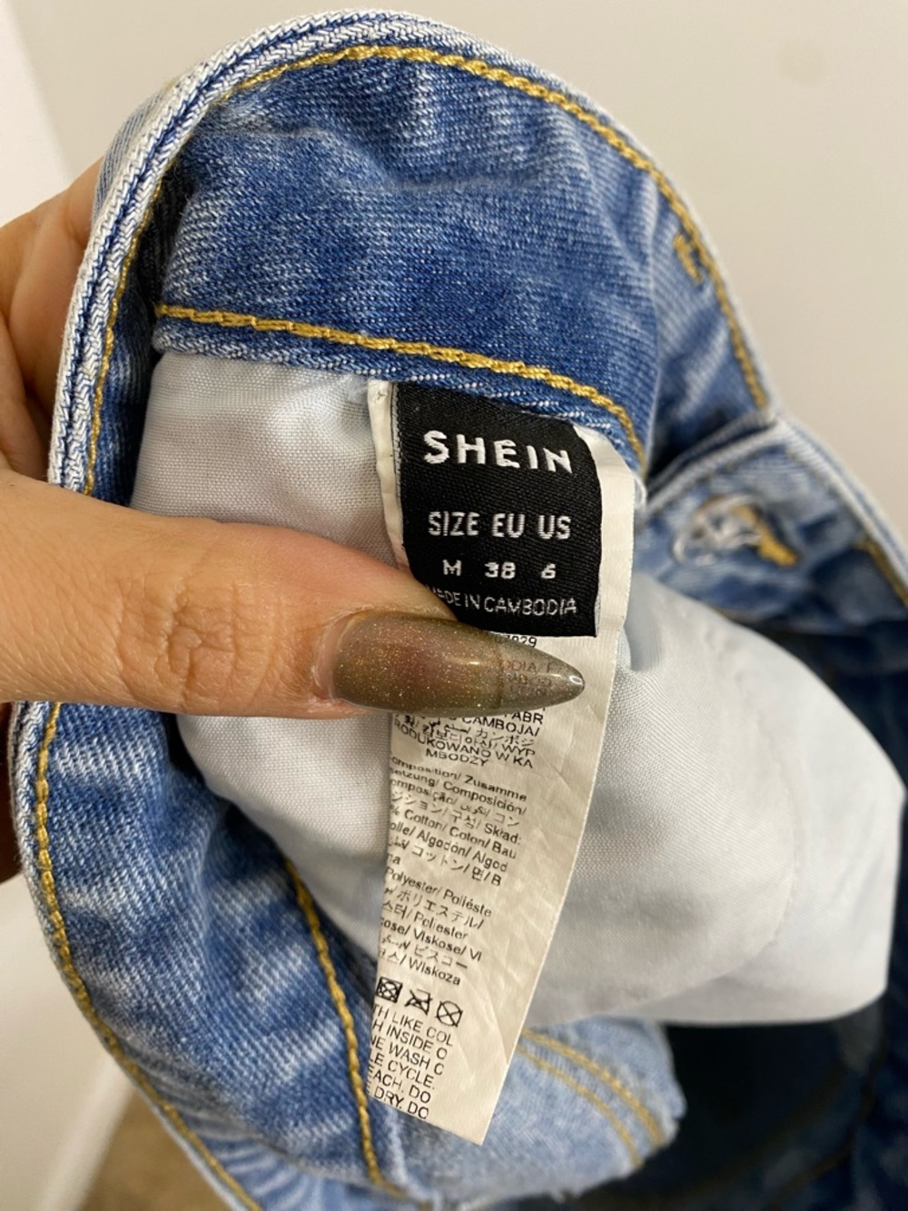 SHEIN Asymmetrical Ripped Denim Short - Picture 7 of 8
